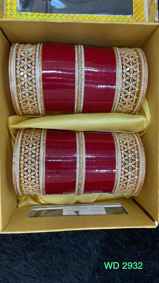 Warm Embrace: Limited Edition Warmy Red Bridal Chooda with Golden Bangles and Sparkling Diamonds